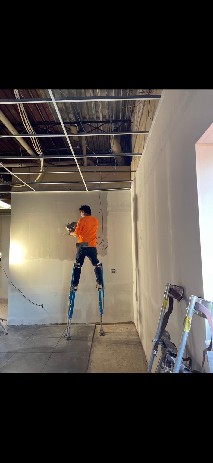 Drywall finishing during a commercial interior renovation